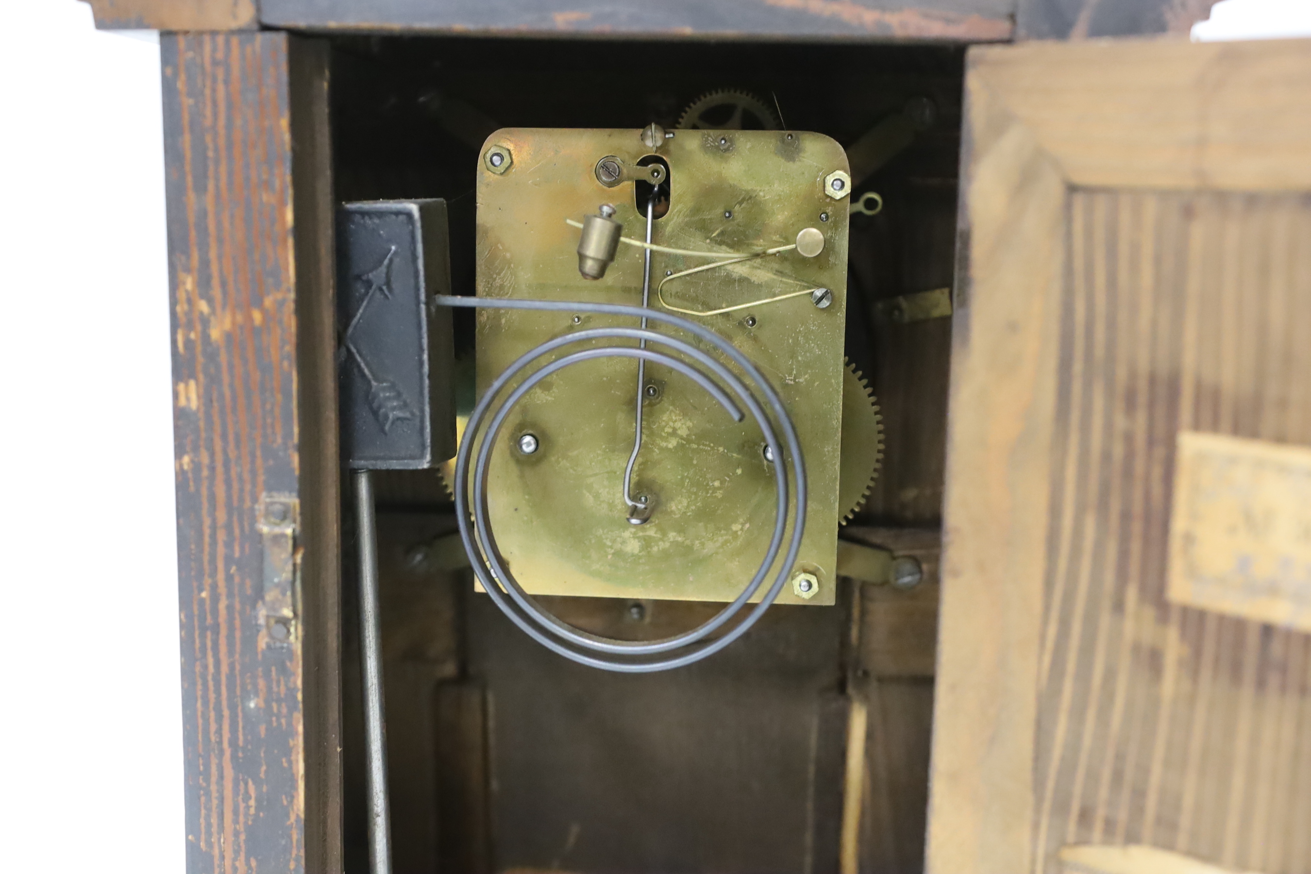 A 19th century Black Forest inlaid walnut mantel clock, 37cm high